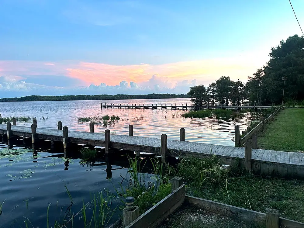 Two of Relaxed Retreat at Carolina King's Lake Marion fishing piers at sunset.