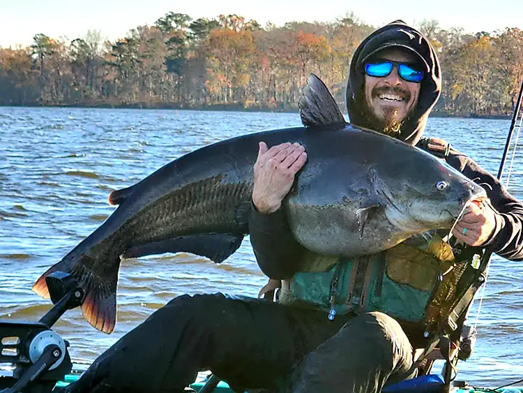 One of our guests with a monster Blue Catfish caught just offshore from Carolina King on Lake Marion, SC.